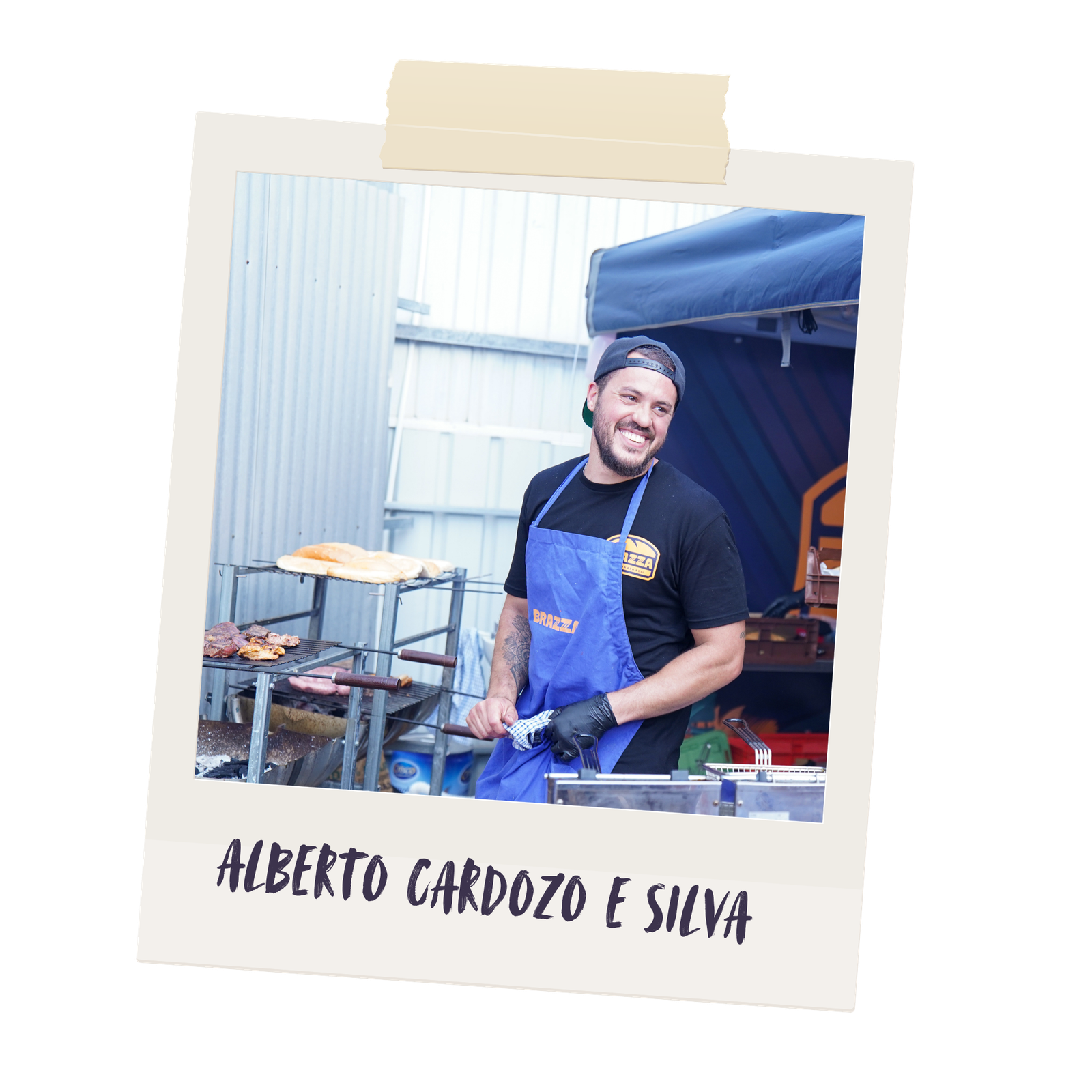 Alberto grilling meat over charcoal at Adelaide Market